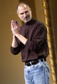SAN JOSE, CA - OCTOBER 26: Steve Jobs of Apple Computer celebrates the release of a new Apple iPod family of products at the California Theatre on October 26, 2004 in San Jose California. (Photo by Tim Mosenfelder/Getty Images)