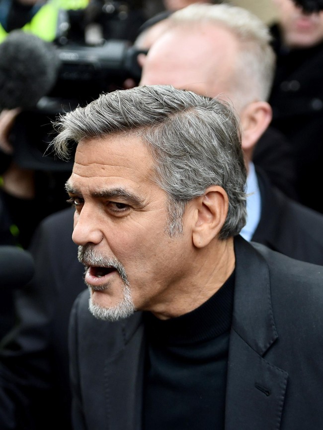 EDINBURGH, SCOTLAND - NOVEMBER 12:  Hollywood actor George Clooney, meets members of the public during  a visit to Social Bite sandwich shop which helps homeless people on November 12, 2015 in Edinburgh,Scotland. The actor visited the Social Bite cafe, which donates all its profits to homeless people, he will also have lunch with a competition winner and address the Scottish Business awards this evening.  (Photo by Jeff J Mitchell/Getty Images)