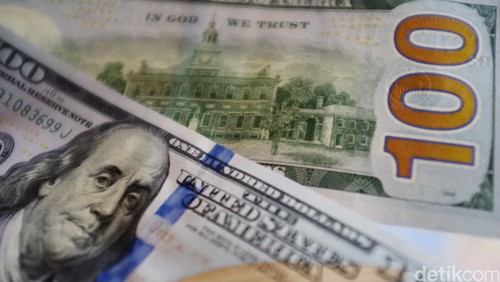 Mata Uang Dollar Amerika.
dikhy sasra/ilustrasi/detikfoto