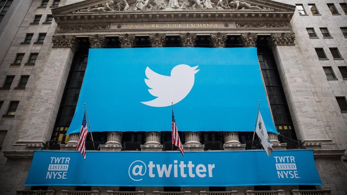 NEW YORK, NY - NOVEMBER 07:  The Twitter logo is displayed on a banner outside the New York Stock Exchange (NYSE) on November 7, 2013 in New York City. Twitter goes public on the NYSE today and is expected to open at USD 26 per share, making the company worth an estimated USD 18 billion.  (Photo by Andrew Burton/Getty Images)