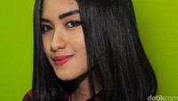 Manisnya Ochi tersenyum. Pool/Ismail/detikFoto.