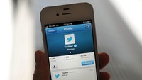 LONDON, ENGLAND - NOVEMBER 07:  In this photo illustration, the Twitter logo and hashtag #Ring! is displayed on a mobile device as the company announced its initial public offering and debut on the New York Stock Exchange on November 7, 2013 in London, England. Twitter went public on the NYSE opening at USD 26 per share, valuing the companys worth at an estimated USD 18 billion.  (Photo by Bethany Clarke/Getty Images)