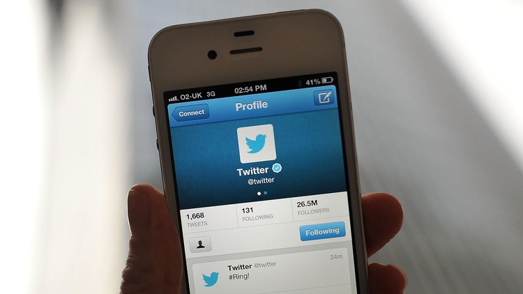 LONDON, ENGLAND - NOVEMBER 07:  In this photo illustration, the Twitter logo and hashtag #Ring! is displayed on a mobile device as the company announced its initial public offering and debut on the New York Stock Exchange on November 7, 2013 in London, England. Twitter went public on the NYSE opening at USD 26 per share, valuing the companys worth at an estimated USD 18 billion.  (Photo by Bethany Clarke/Getty Images)