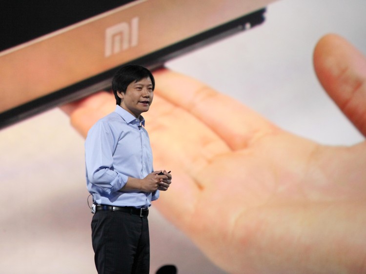 BEIJING, CHINA - MAY 15:  (CHINA OUT) Xiaomi CEO Lei Jun speaks during a product launch on May 15, 2014 in Beijing, China. Privately owned Chinese electronics company Xiaomi has lauched its first tablet and low-price 4K TV on Thursday. The newly launched 