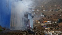 Suasana usai penyemprotan di kawasan penduduk Peru. Mariana Bazo/Reuters/detikFoto.