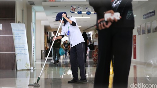 Ilustrasi Cleaning Service (petugas pembersih ruangan)