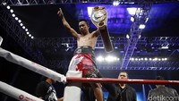 Petinju Indonesia Daud Yordan berhasil mempertahankan gelar juara kelas ringan versi WBO Asia Pasific dan Afrika setelah menang angka atas Yoshitaka Kato.