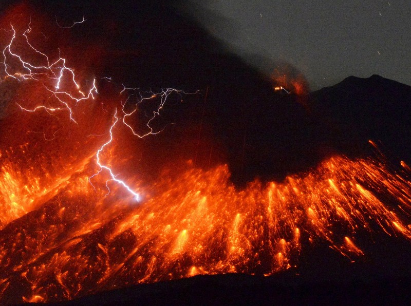 Volcanic lightning is seen at an eruption of Mount Sakurajima, in this photo taken from Tarumizu city, Kagoshima prefecture, southwestern Japan, in this photo taken by Kyodo February 5, 2016. A Japanese volcano about 50 km (30 miles) from a nuclear plant erupted on Friday, Japan's Meteorological Agency said, sending fountains of lava into the night sky. Mandatory credit REUTERS/Kyodo  ATTENTION EDITORS - FOR EDITORIAL USE ONLY. NOT FOR SALE FOR MARKETING OR ADVERTISING CAMPAIGNS. THIS IMAGE HAS BEEN SUPPLIED BY A THIRD PARTY. IT IS DISTRIBUTED, EXACTLY AS RECEIVED BY REUTERS, AS A SERVICE TO CLIENTS. MANDATORY CREDIT. JAPAN OUT. NO COMMERCIAL OR EDITORIAL SALES IN JAPAN.      TPX IMAGES OF THE DAY