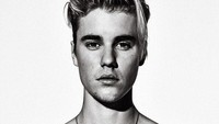 Di usia 14 tahun, Justin Bieber sudah menjelma menjadi fenomena baru di industri musik dunia. GQ/Eric Ray Davidson