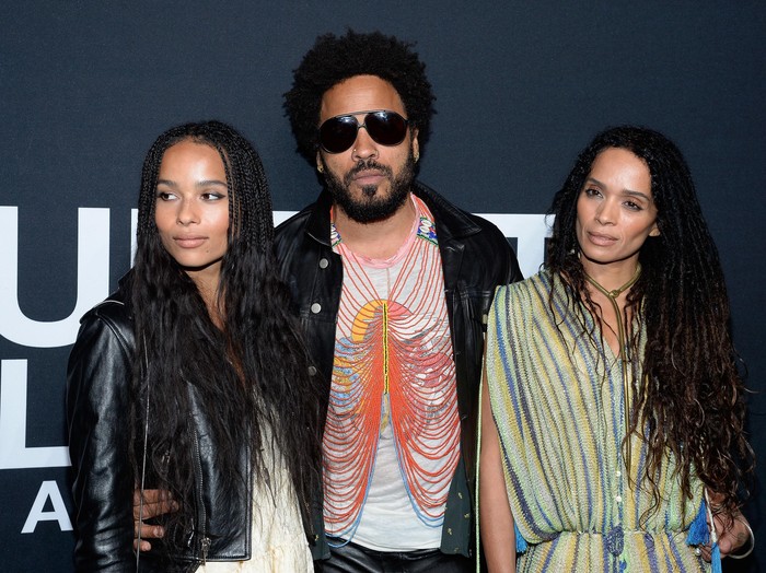 Zoe & Lenny Kravitz LOS ANGELES, CA - FEBRUARY 10: Musician Lenny Kravitz (center) and actresses Zoe Kravitz (L) and Lisa Bonet R) attend the Saint Laurent show at The Hollywood Palladium on February 10, 2016 in Los Angeles, California. (Photo by Kevork Djansezian/Getty Images)
