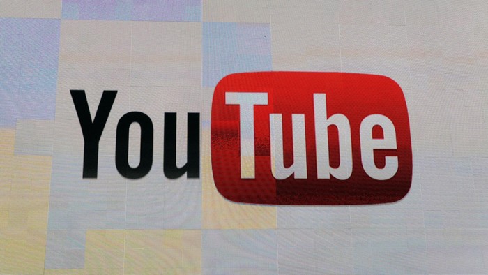 LAS VEGAS, NV - JANUARY 12:  The YouTube logo appears on screen before a keynote address by Vice President of Global Content Partnerships at YouTube Robert Kyncl at the 2012 International Consumer Electronics Show at the Las Vegas Hotel & Casino January 12, 2012 in Las Vegas, Nevada. CES, the worlds largest annual consumer technology trade show, runs through January 13 and features more than 3,100 exhibitors showing off their latest products and services to about 140,000 attendees.  (Photo by Ethan Miller/Getty Images)
