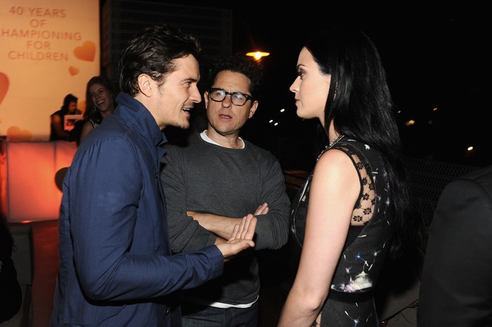 SANTA MONICA, CA - APRIL 10:  (L-R) Actor Orlando Bloom, host J.J. Abrams, and singer Katy Perry attend Coach's 3rd Annual Evening of Cocktails and Shopping to Benefit the Children's Defense Fund hosted by Katie McGrath, J.J. Abrams and Bryan Burk at Bad Robot on April 10, 2013 in Santa Monica, California.  (Photo by Stefanie Keenan/Getty Images for Coach)