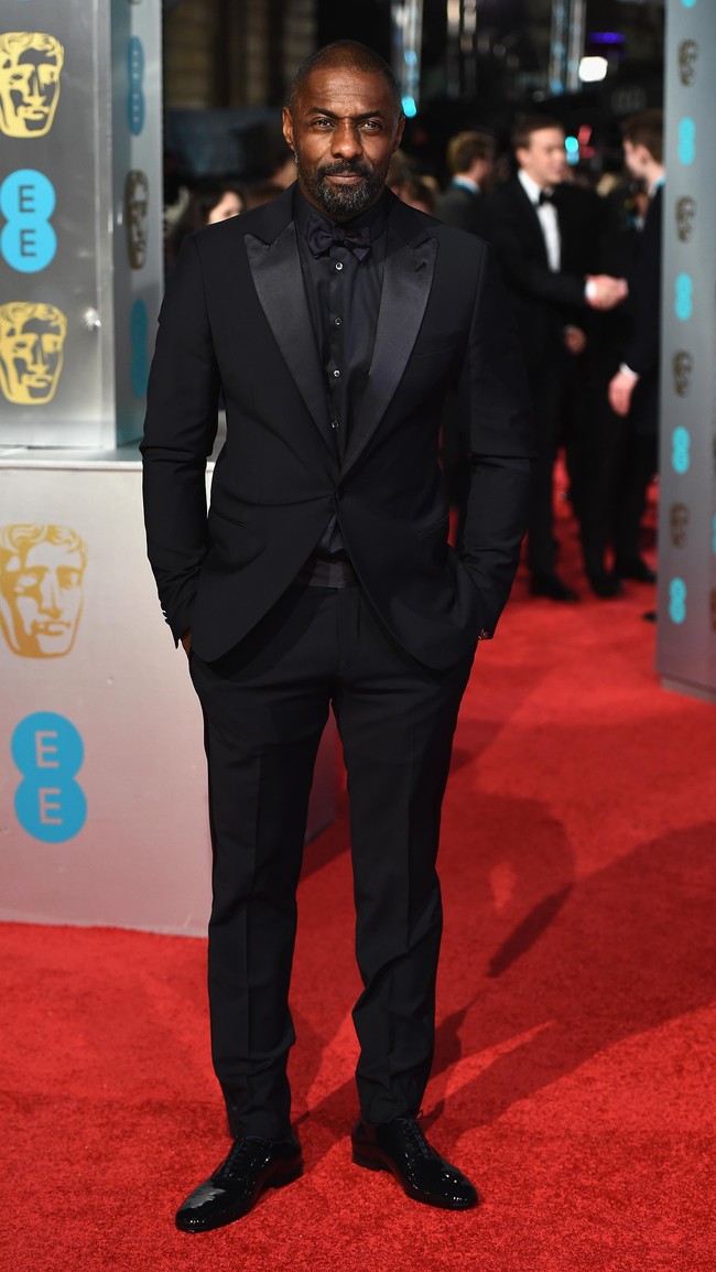 Satu lagi aktor kulit hitam yang dinilai tampan. Idris Elba, bintang Star Trek Beyond itu mempu mengalahkan ketampanan Ryan Gosling.  Foto: Ian Gavan/Getty Images