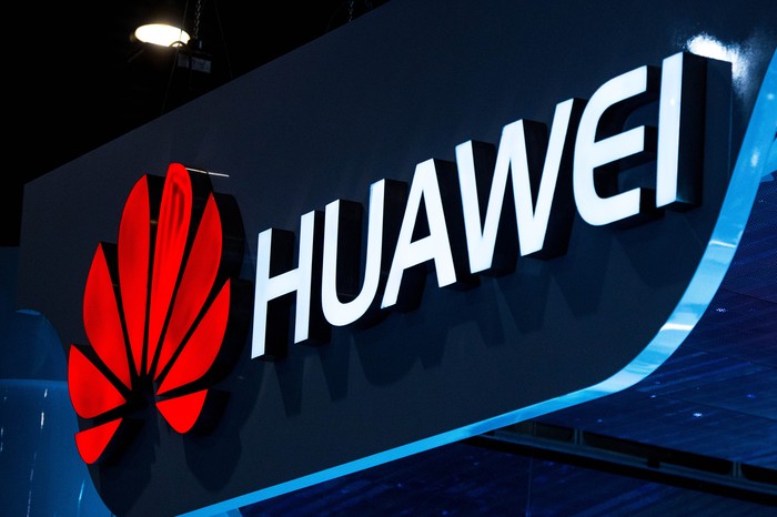 BARCELONA, SPAIN - MARCH 03:  A logo sits illuminated outside the Huawei pavilion during the second day of the Mobile World Congress 2015 at the Fira Gran Via complex on March 3, 2015 in Barcelona, Spain. The annual Mobile World Congress hosts some of the wolds largest communication companies, with many unveiling their latest phones and wearables gadgets.  (Photo by David Ramos/Getty Images)