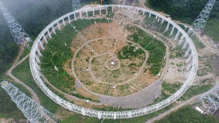 The five-hundred-metre Aperture Spherical Radio Telescope (FAST), nestled between hills in the southwestern province of Guizhou, is due to start operation this year (AFP Photo/File)