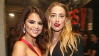 Selena Gomez dan Amber Heard. Christopher Polk/Getty Images for NARAS/detikFoto.