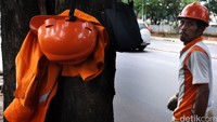 Jalanan Jakarta bebas genangan berkat 15 ribu pasukan oranye, Satgas Kebersihan dan Genangan yang dibentuk Pemprov DKI Jakarta.
