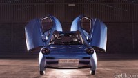 Mobil ini memiliki desain yang unik dengan pintu terbuka ke atas, mirip dengan mobil-mobil sport. Foto: Rasa