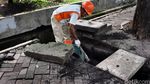 Pasukan Oranye Jaga Jakarta Bebas Genangan