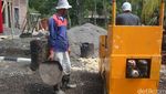 Pria Lulusan SD Ciptakan Alat Berat Mini