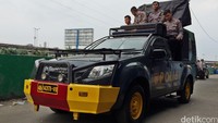 Polisi berpatroli di kawasan Kalijodo. Rinaldy Sofwan Fakhrana/CNN Indonesia.