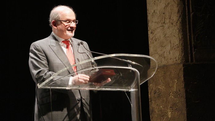 NEW YORK, NY - DECEMBER 10:  Novelist Salman Rushdie speaks onstage at the Norman Mailer Center 7th Annual Awards ceremony and celebration at Pratt Institute on December 10, 2015 in New York City.  (Photo by Thos Robinson/Getty Images for Norman Mailer Center, Inc.)