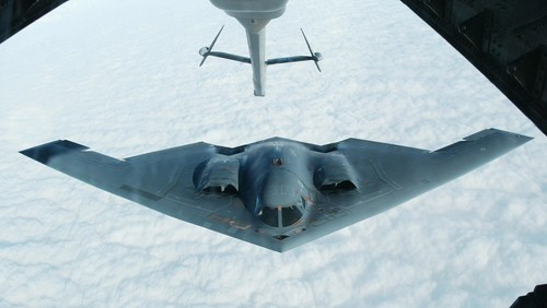 A Northrop Grumman B-2 Spirit stealth bomber approaches an U.S. Air Force KC-10(A) tanker plane over the Missouri sky to receive an aerial refueling after taking off from the Whiteman Air Force Base in Johnson County, Missouri in this October 30, 2002 file photo. The U.S. Government Accountability Office (GAO) on February 16, 2016 rejected a protest filed by Boeing Co and Lockheed Martin Corp against a multibillion-dollar bomber contract awarded to Northrop Grumman Corp  by the U.S. Air Force in October.  REUTERS/Hyungwon Kang/Files