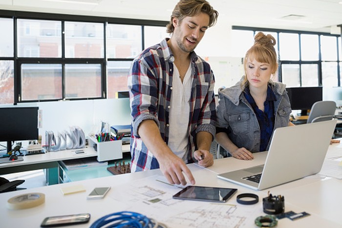Business people working at desk in office