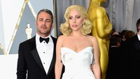Taylor Kinney dan Lady Gaga. Frazer Harrison/Getty Images/detikFoto.
