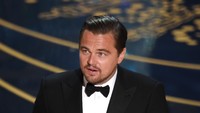 Akhirnya, Leonardo DiCaprio berhasil membawa pulang piala Oscar pertamanya. Kevin Winter/Getty Images/detikFoto.
