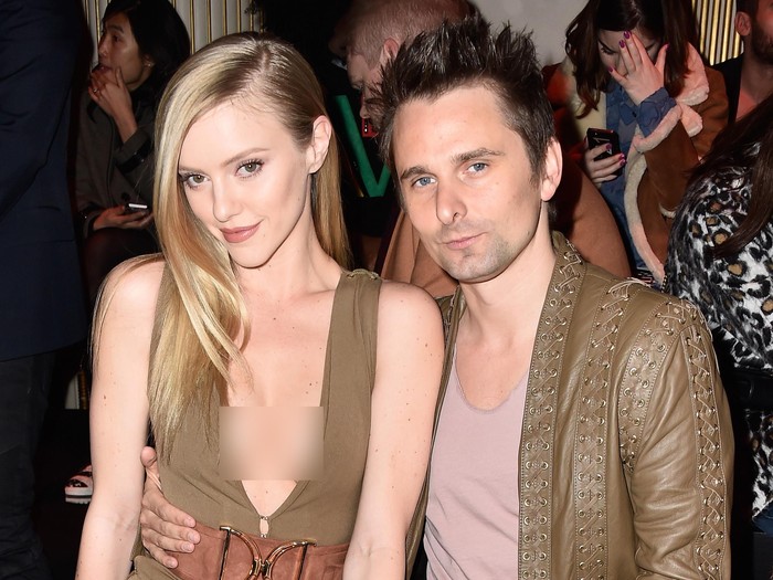 PARIS, FRANCE - MARCH 03:  Elle Evans and Matt Bellamy attend the Balmain show as part of the Paris Fashion Week Womenswear Fall/Winter 2016/2017 on March 3, 2016 in Paris, France.  (Photo by Pascal Le Segretain/Getty Images)