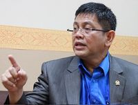 Politikus Nasdem Taufiqulhadi meminta PAN keluar dari koalisi.