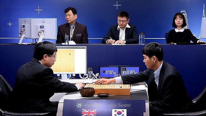 SEOUL, SOUTH KOREA - MARCH 10:  In this handout image provided by Google, South Korean professional Go player Lee Se-Dol (R) puts his first stone against Googles artificial intelligence program, AlphaGo, during the Google DeepMind Challenge Match on March 10, 2016 in Seoul, South Korea. Lee Se-dol is playing a five-match series against a computer program developed by a Google, AlphaGo.  (Photo by Google via Getty Images)