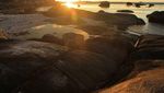Momen Sunset Cantik di Pantai Tanjung Tinggi, Belitung