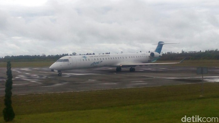 Mendarat di Silangit, Penumpang Garuda Disambut Tarian Tortor