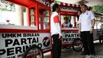 Perindo Berikan Gerobak Untuk Pedagang