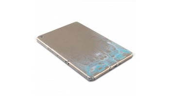 Bagian belakangnya terdapat cover yang mirip dengan Mi Pad. Tapi lapisan ini dapat dibuka. Foto: internet 