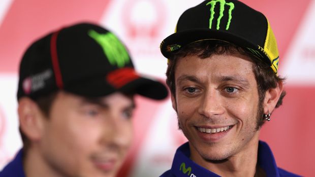 PHILLIP ISLAND, AUSTRALIA - OCTOBER 15: Valentino Rossi of Movistar Yamaha MotoGP and Italy looks at team mate Jorge Lorenzo of Spain during a MotoGP press conference ahead of the 2015 MotoGP of Australia at Phillip Island Grand Prix Circuit on October 15, 2015 in Phillip Island, Australia.  (Photo by Cameron Spencer/Getty Images)