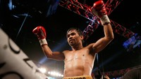 Dalam pertarungan 12 ronde di MGM Grand Garden Arena, Las Vegas, Amerika Serikat, Minggu (10/4/2016) pagi WIB, ketiga juri kompak memenangkan Pacquiao dengan skor sama, 116-110. Christian Petersen/Getty Images.