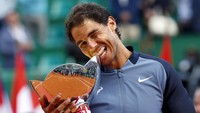Bagi Nadal, ini adalah gelar mayor pertama sejak memenangi Prancis Terbuka 2014. Ini juga gelar ATP Masters ke-28 dalam final ke-100 [68 menang, 32 kalah] dia di nomor tunggal. REUTERS/Eric Gaillard.