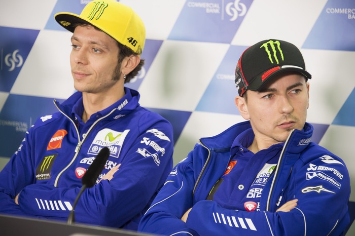 DOHA, QATAR - MARCH 16:  Jorge Lorenzo of Spain and Movistar Yamaha MotoGP and Valentino Rossi of Italy and Movistar Yamaha MotoGP (L) look on during the press conference during the MotoGp of Qatar - Press Conference at Losail Circuit on March 16, 2016 in Doha, Qatar.  (Photo by Mirco Lazzari gp/Getty Images)