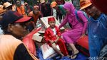 Banjir Melanda, Kartinian Tetap Berlangsung