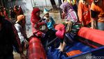 Banjir Melanda, Kartinian Tetap Berlangsung