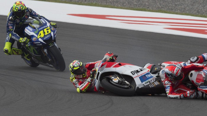 RIO HONDO, SANTIAGO DEL ESTERO - APRIL 03: Andrea Dovizioso of Italy and Ducati Team and Andrea Iannone of Italy and Ducati Team crashed out during the MotoGP Race during the MotoGp of Argentina - Race at Termas De Rio Hondo Circuit on April 03, 2016 in Rio Hondo, Argentina.  (Photo by Mirco Lazzari gp/Getty Images)