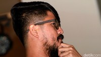 Ariyo tampil dengan gaya rambut undercut. Ia juga tampak memelihara janggut di wajahnya. Pool/Gus Mun/detikFoto