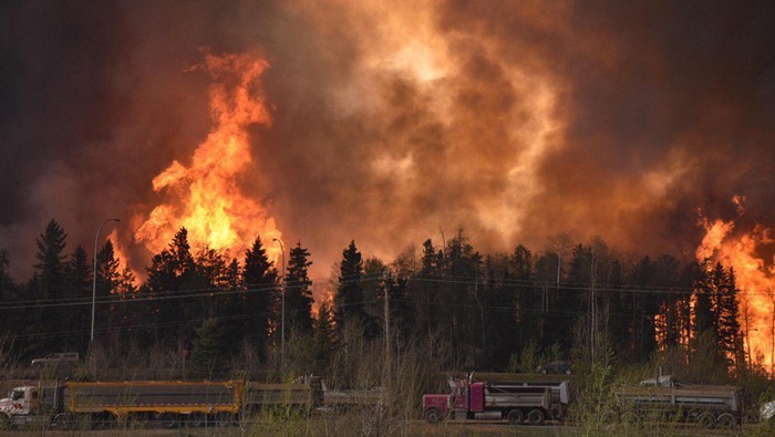 Wildfire is worsening along highway 63 Fort McMurray, Alberta Canada May 3, 2016. The whole city of Fort McMurray, Alberta, the gateway to Canadas oil sands region, is under a mandatory evacuation order because of an uncontrolled wildfire that is rapidly spreading, local authorities said on Tuesday. Courtesy CBC News/Handout via REUTERS ATTENTION EDITORS - THIS IMAGE WAS PROVIDED BY A THIRD PARTY. EDITORIAL USE ONLY. NO RESALES. NO ARCHIVE. MANDATORY CREDIT. ONE TIME USE ONLY