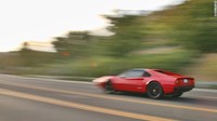 Ferrari 308 GTS ini bisa jadi Ferrari pertama yang menggunakan motor listrik, bukan mesin V6 sampai V12 yang biasa dipasang Ferrari. Foto: CNN