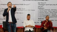 Pengamat politik Boni Hargens menenangkan peserta diskusi yang sempat terlibat adu mulut karena saling dukung mendukung salah satu calon.