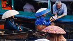 Peredaran dan Penukaran Uang di Pasar Terapung