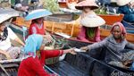 Peredaran dan Penukaran Uang di Pasar Terapung
